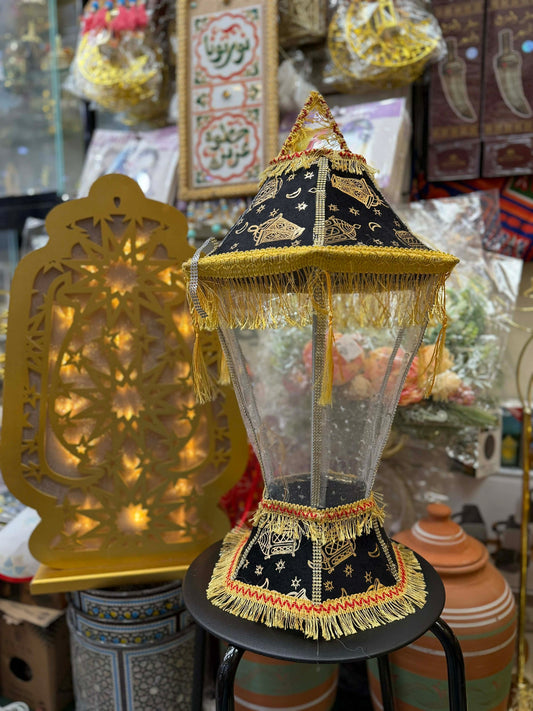 Black and gold Fanoos sings and lights up